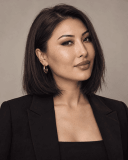 Malika Studio, a makeup artist in an editorial studio portrait.