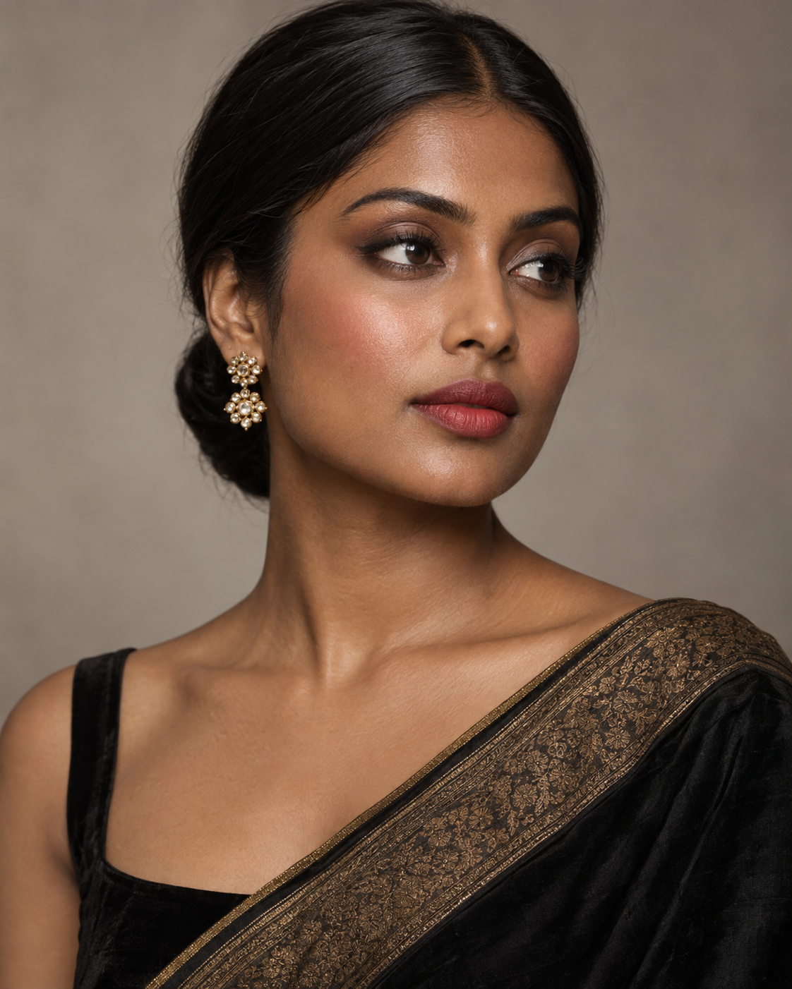 Classic Elegance makeup with a refined smoky eye and muted red lip.